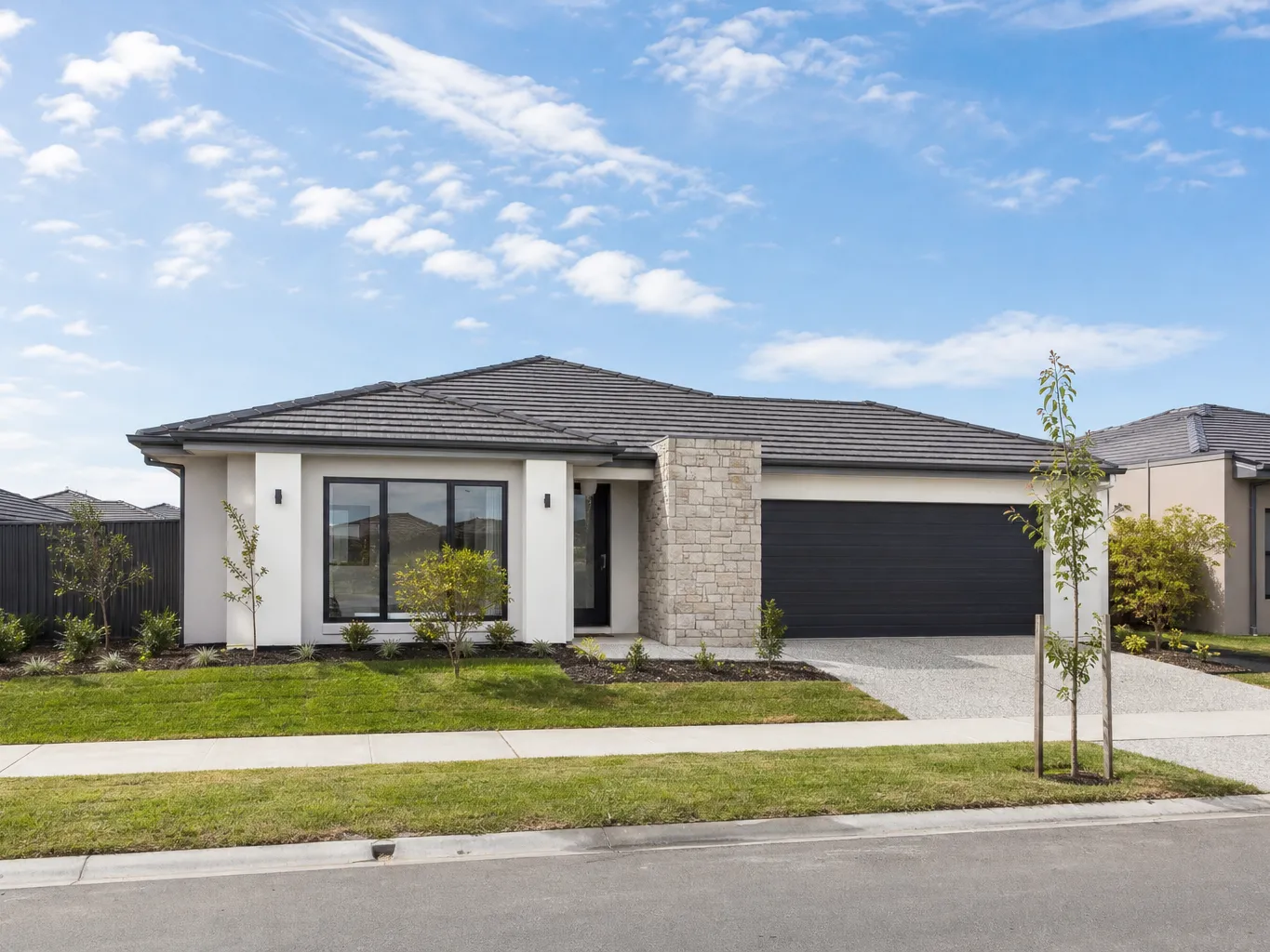 Modern estate home with double-glazed aluminium windows under open sky in Melbourne's west
